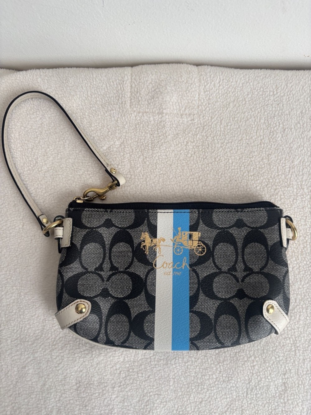Coach | Heritage Stripe Signature Wristlet w/blue & white "racing" stripe.